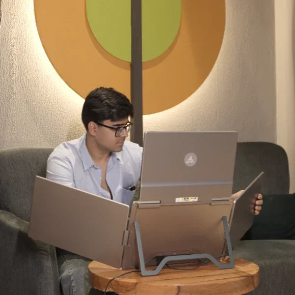 Laptop quad screen setup used by professional for multitasking and
productivity