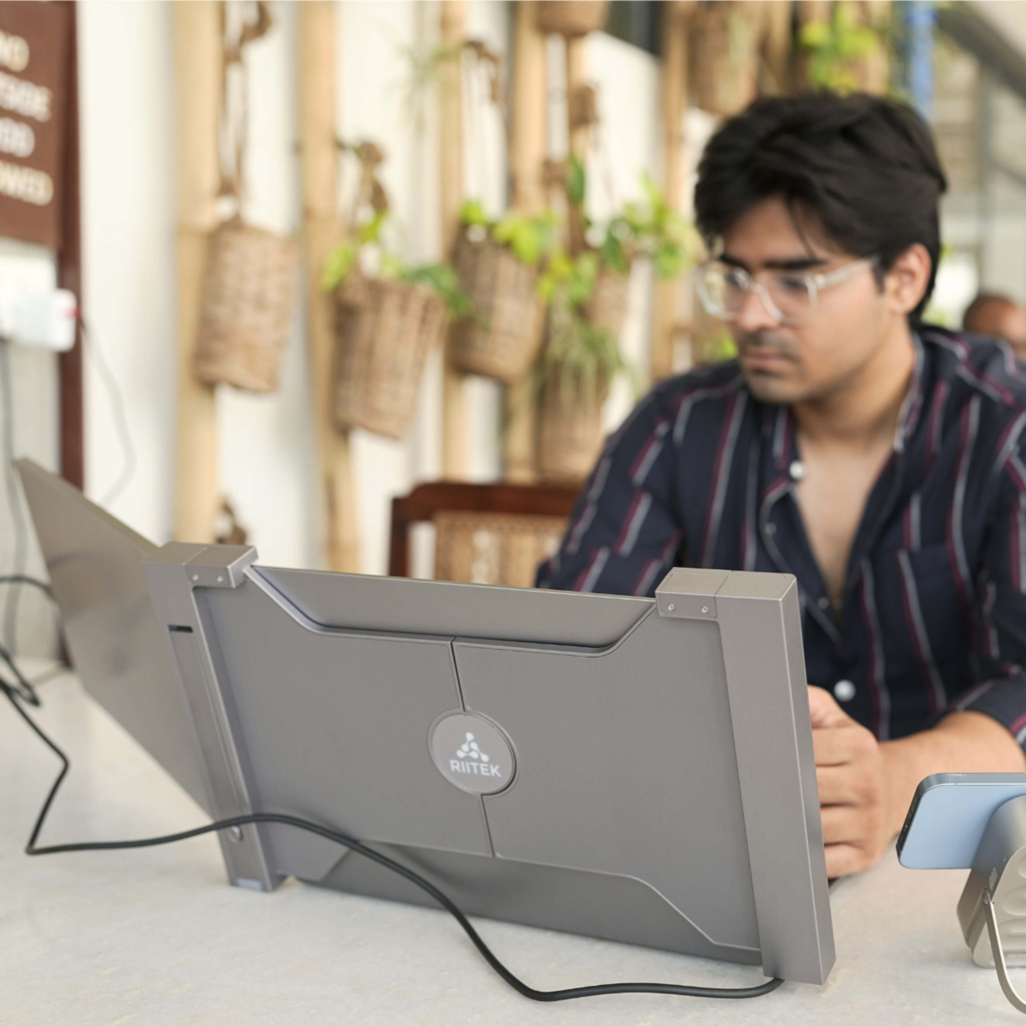 RIITEK 14 inch dual extra screen for laptop while working at a home office or café desk with the dual screen setup